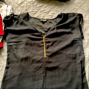 Black blouse with gold zipper